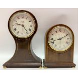 Two mahogany cased quartz mantle clocks.