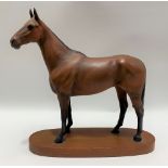 Beswick Pottery matt glazed horse 'Arkle Champion Steeplechaser' upon oval wooden base, height 30cm