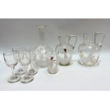 Four clear glass Mary Gregory wares; together with a set of four 19th Century cordial glasses.