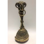Victorian brass door stop with goat head and ring top, height 39cm