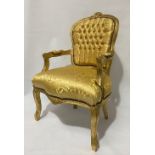 French style gilded fauteuil, with gold damask upholstery