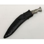 A kukri with steel handle, smaller dagger and within original leather sheath, length overall 37.5cm