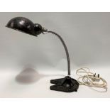 A vintage industrial desk lamp upon cast iron stand by Hawkins of Drury Lane