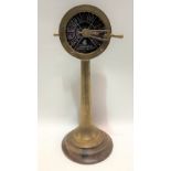 A brass ship's telegraph by Chadburns, Liverpool & London, upon hardwood turned base, height 43cm