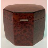 Early 20th Century octagonal section burr veneered hinge-lidded tea caddy, height 9cm