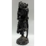 Chinese carved root figure of a sage with walking stick upon a turtle, height 23.5cm (AF)