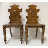 Pair of Victorian oak shield-back hall chairs