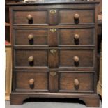 17th Century style oak chest of four long drawers upon bracket feet, width 91cm