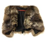 A brown fox fur cape.