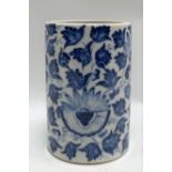 Chinese blue and white underglaze cylindrical brush pot decorated with flowerheads and leaf scrolls,