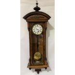 A 19th Century walnut cased two-train Vienna wall clock, with 6.5in white enamel dial with black