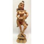 Indian carved wood and polychrome painted figure of a female dancer upon rosewood base, height