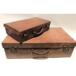 An early 20th Century tan leather suitcase, width 66cm; together with a smaller tan leather
