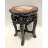 Small Chinese hardwood stand with pink veined marble top, the lobed top with beaded edge, the base