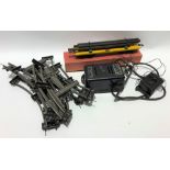 Model railway O gauge track together with a power unit no. 1 by International Model Aircraft Ltd and
