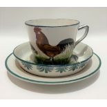 Wemyss ware cockerel and chicken decorated trio with impressed and printed marks for T. Goode & Co
