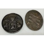 Two heavy silver medallions, one cast to one side with three hounds under a blank armorial, by