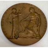 A bronze medal by Erik Lindberg 'LUX. NOVA. MEDICINAE. NOVA, SUBSSIDIA. PARAVIT' dated 1928 in Roman