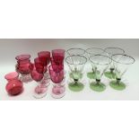 Set of five Victorian cranberry glass wine glasses, one other wine glass and two vases; together