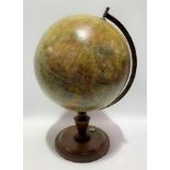 A 20th Century German terrestrial globe by Dietrich Reimers and on turned wood stand with compass,