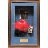 A signed Muhammad Ali boxing glove within framed and glazed case, 72cm x 48cm overall