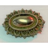A Victorian gold oval brooch, tests 9ct, weight 2.2g approx (AF).