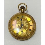 An 18ct gold cased ladies crown wind pocket watch, the 37mm gilt dial with black Roman Numerals
