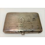 A George V silver engine turned three-section stamp and card case by Charles S. Green & Co,