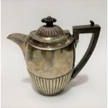 An Edwardian silver half fluted oval section hot water pot, maker R.P, London 1907, height 18.5cm,