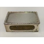 A 19th Century style George VI silver engine turned matchbox case with foliate cast edge, maker