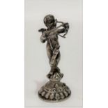 A Victorian silver desk seal in the form of cupid, with oval armorial engraved matrix, height