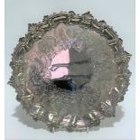 A George III Scottish silver salver with pie crust foliate scroll cast rim, the well foliate