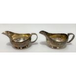 A heavy pair of George VI silver gravy boats, maker G.E, London 1939, length 17.5cm, weight