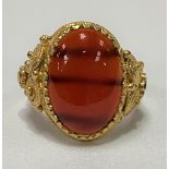 Continental renaissance style high purity gold carnelian cabochon set ring, the shank with