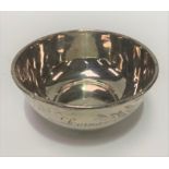A George V silver christening bowl of plain form, inscribed 'Lorna', maker WB, Birmingham 1919,