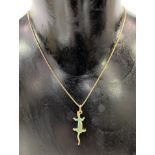 18ct gold and green enamel lizard pendant stamped 750 upon an 18ct gold chain, length of pendant