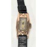A 9ct gold ladies Art Deco manual wind wristwatch with seventeen jewel movement and on leather