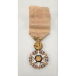 An Order of the Rose Knight's Cross miniature medal in yellow metal and enamels, decorated to both