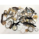 A quantity of vintage watch parts and spares.