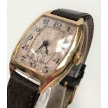 1920's Omega 18ct gold cased gentlemans wristwatch, the 22mm silvered dial with stylised Arabic