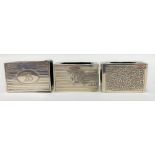 Two silver engine turned matchbox cases (one AF); together with an Indian white metal embossed