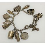A silver charm bracelet, weight 35g approx.