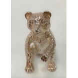 A modern silver model of a bear, stamped 925 and with export marks, London 1975, height 4.5cm,