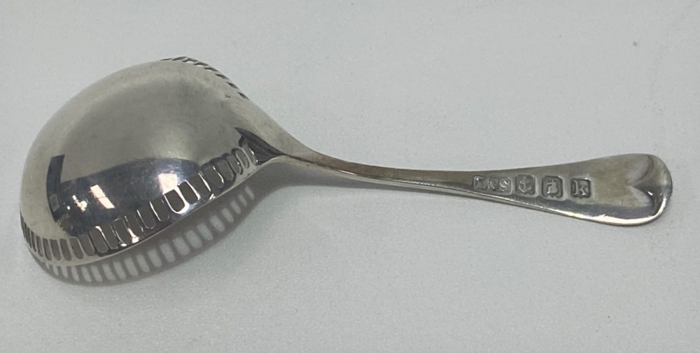 An Edwardian Britannia standard silver caddy spoon, the handle with bright cut decoration, the - Image 2 of 2
