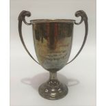A George V silver twin handled pedestal trophy cup, with engraved decoration, London 1923, height
