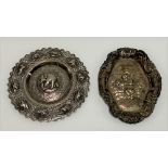 An Edwardian silver embossed pin tray, Birmingham 1904, width 12cm (af); together with an Indian