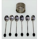 A set of six George V silver demi-tasse coffee bean spoons, maker S LD, Birmingham 1923; together