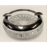 A white metal mounted cut glass ashtray, stamped S. & F. 925, diameter 12.5cm.