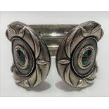 A heavy and substantial contemporary Scottish silver gentleman's arm cuff with two tartan coloured