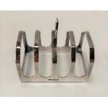 George V silver four-section toast rack, maker E.V, Sheffield 1933, width 7.5cm, weight 1.80oz